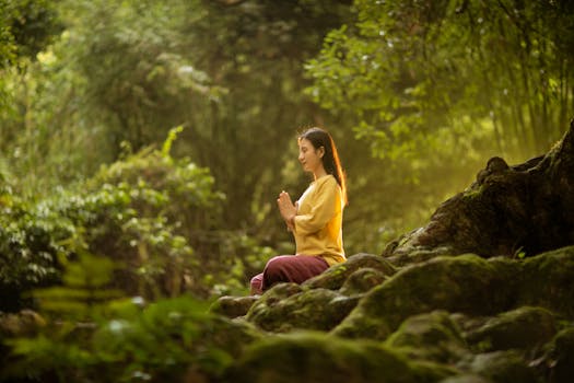 A student practicing yoga in a serene environment