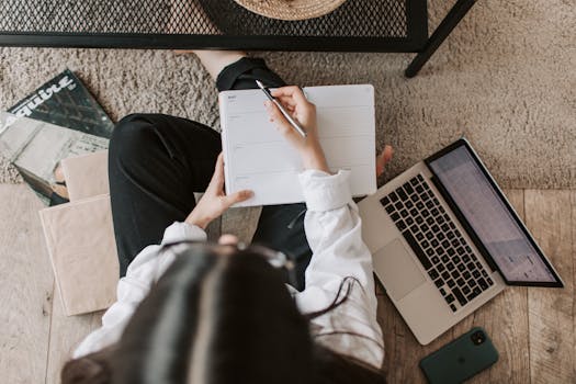 student studying with a laptop