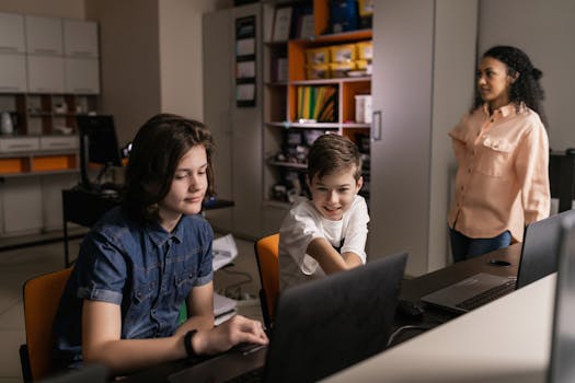 students studying with laptops