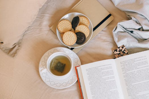 self-care essentials: cozy blanket, book, and tea