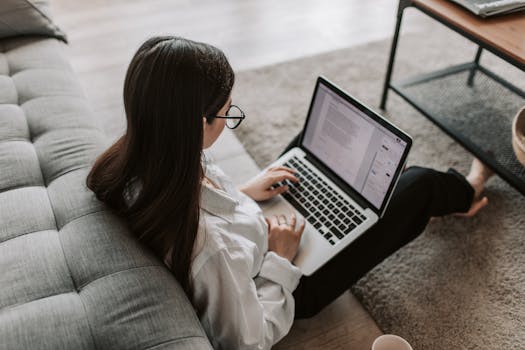 students using laptops for online networking