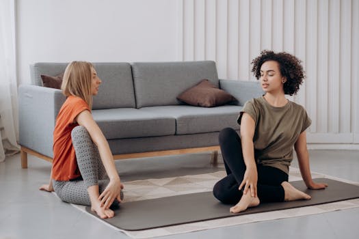 student practicing yoga at home