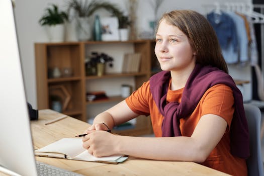 student studying with a smile